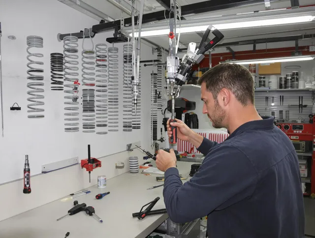 Aurora Garage Door Repair safety certified technician performing precision spring replacement in Aurora